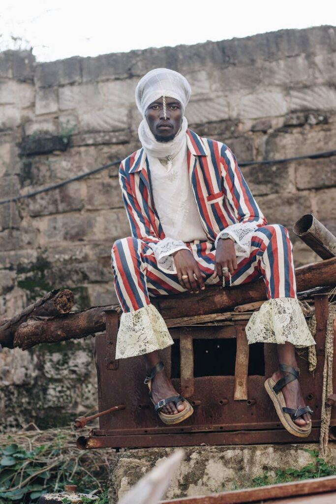 Man Sitting on Brown wood